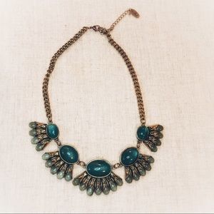 Green and gold tone collar necklace